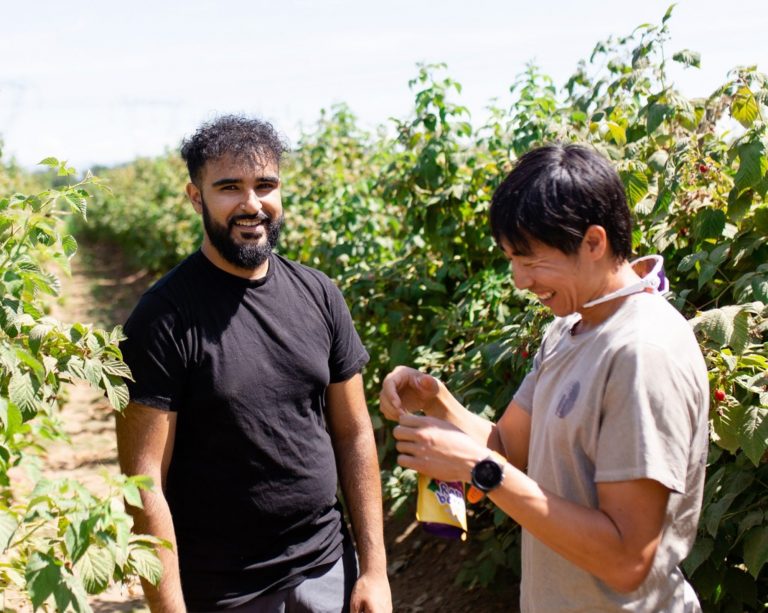 Origo founder visiting a berry farm in British Columbia's Fraser Valley