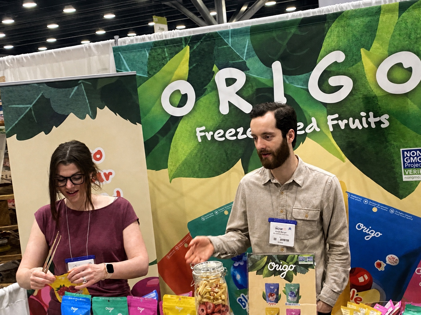 The Origo Foods booth at CHFA West in Vancouver, sampling freeze-dried fruit with visitors